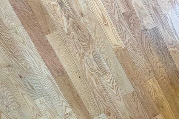 Engineered timber planks laid in a modern open-plan space