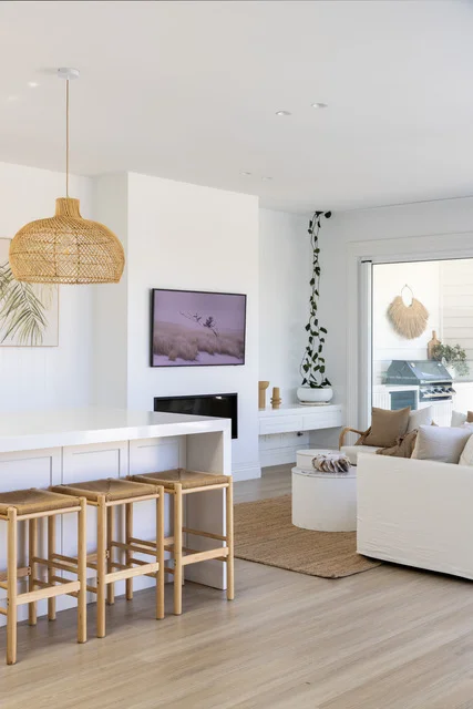 Modern Sydney living room with light timber flooring and coastal interior design